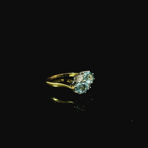 18ct White Gold Aquamarine and Diamond Oval Cluster Ring Andrew Smith Jewellers