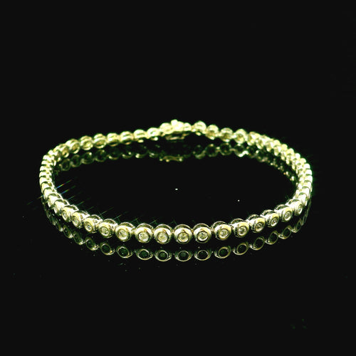 white gold line bracelet with round brilliant cut diamonds. diamond bracelet for women. diamond jewellery west malling