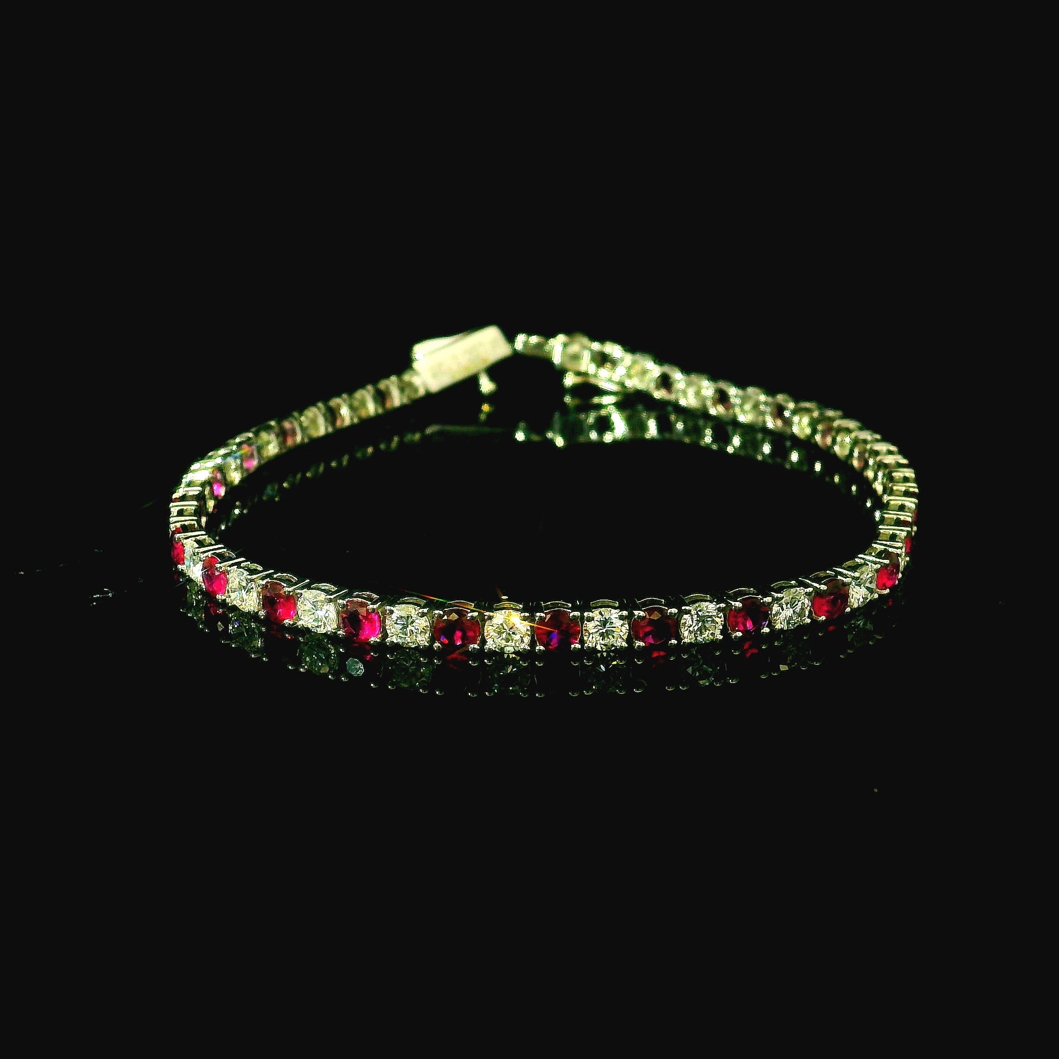 women's gold bracelet with rubies and diamonds. red ruby jewellery. diamond jewellery. gifts for women