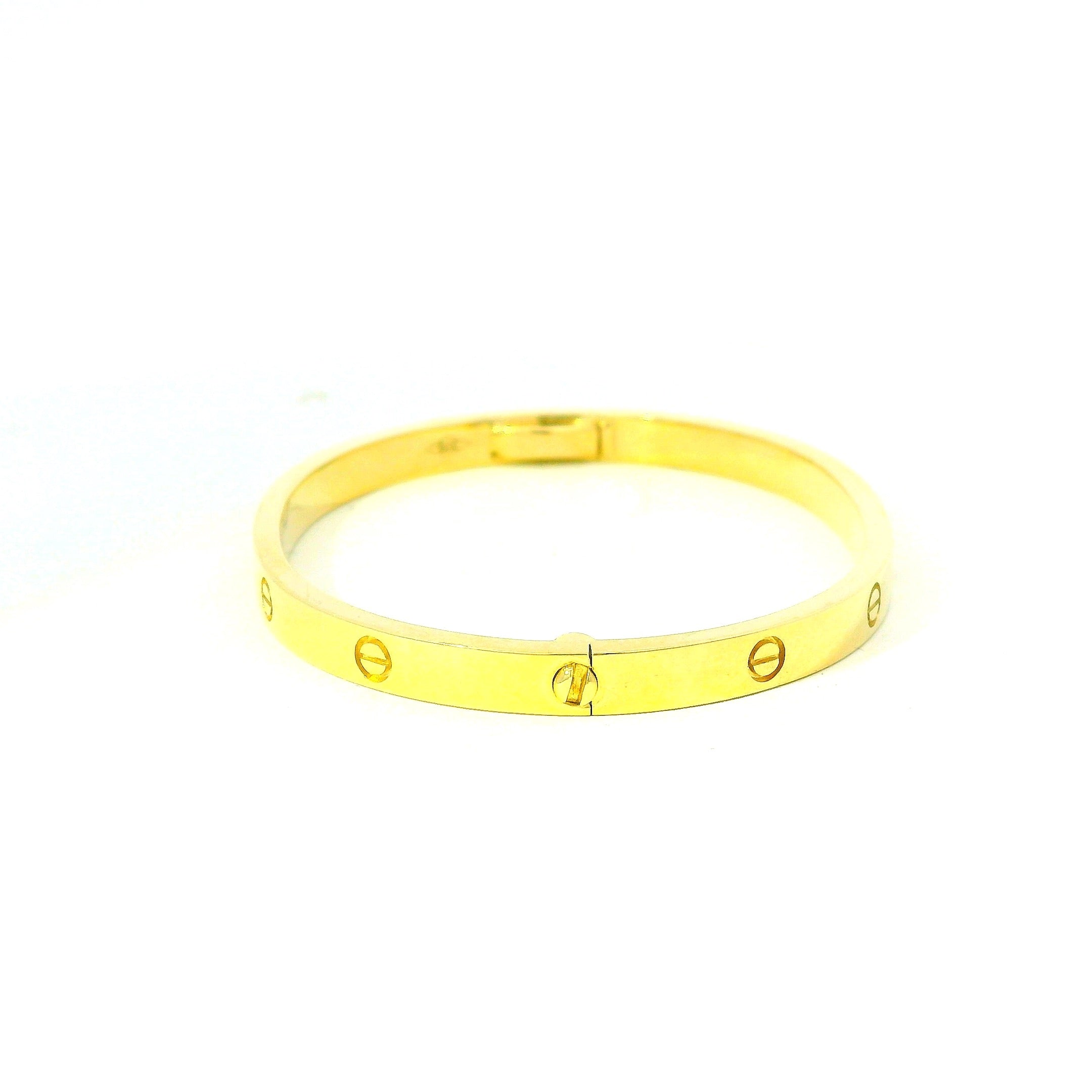 solid gold bangle small for women. small solid gold bangle. gold jewellery for women in west malling
