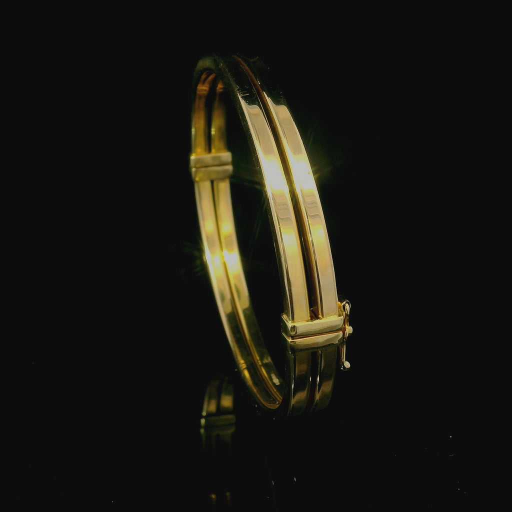 yellow gold bangle for women. bangles for women. bangle jewellery. jewellery for women in west malling. kent jewellery