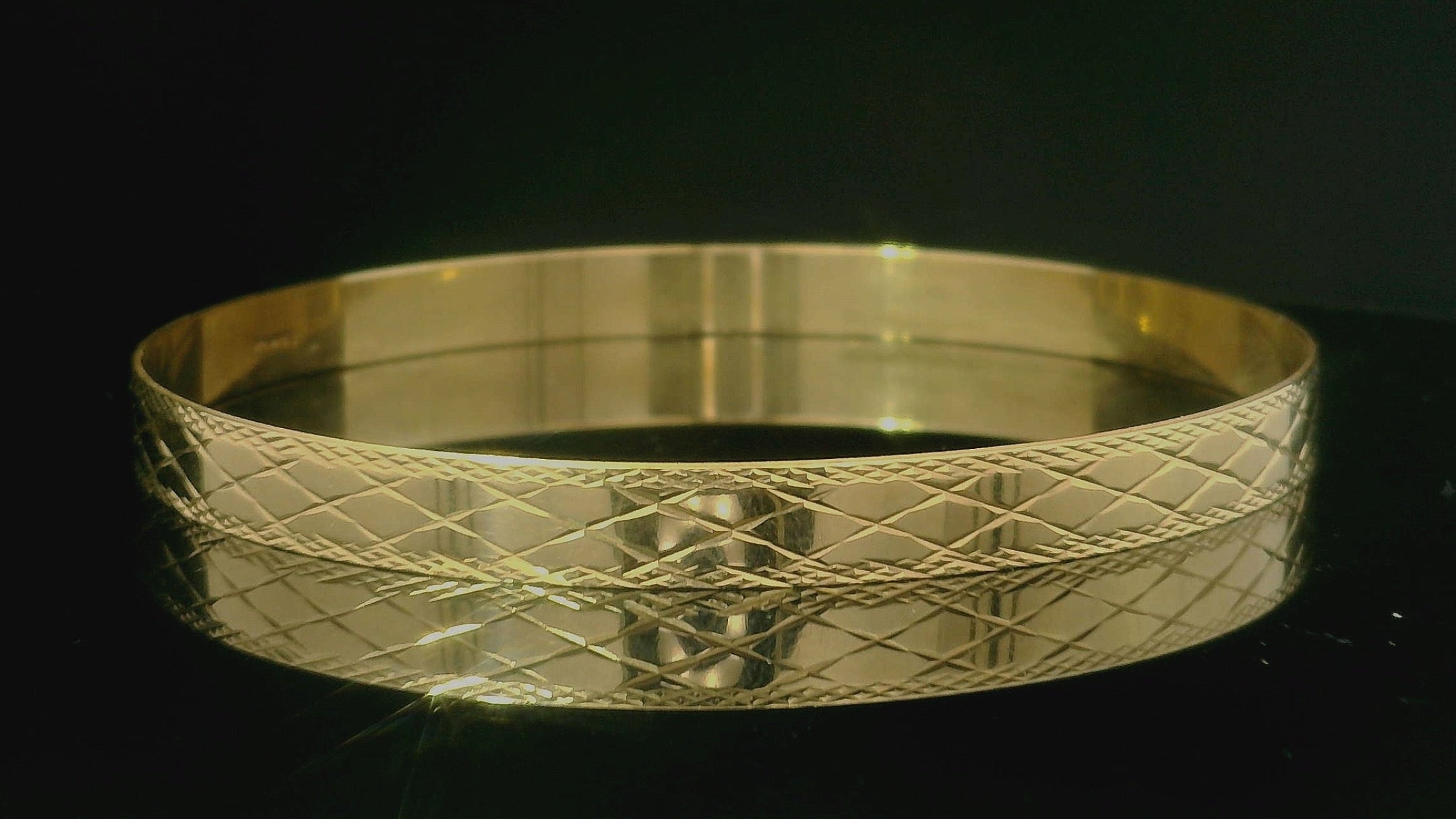 gold criss cross pattern bracelet