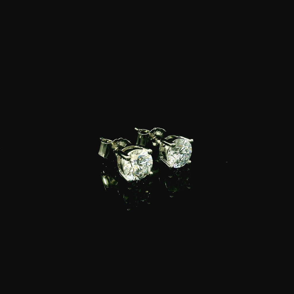 platinum stud earrings for women. diamond platinum stud earrings. lab grown diamonds for women. 