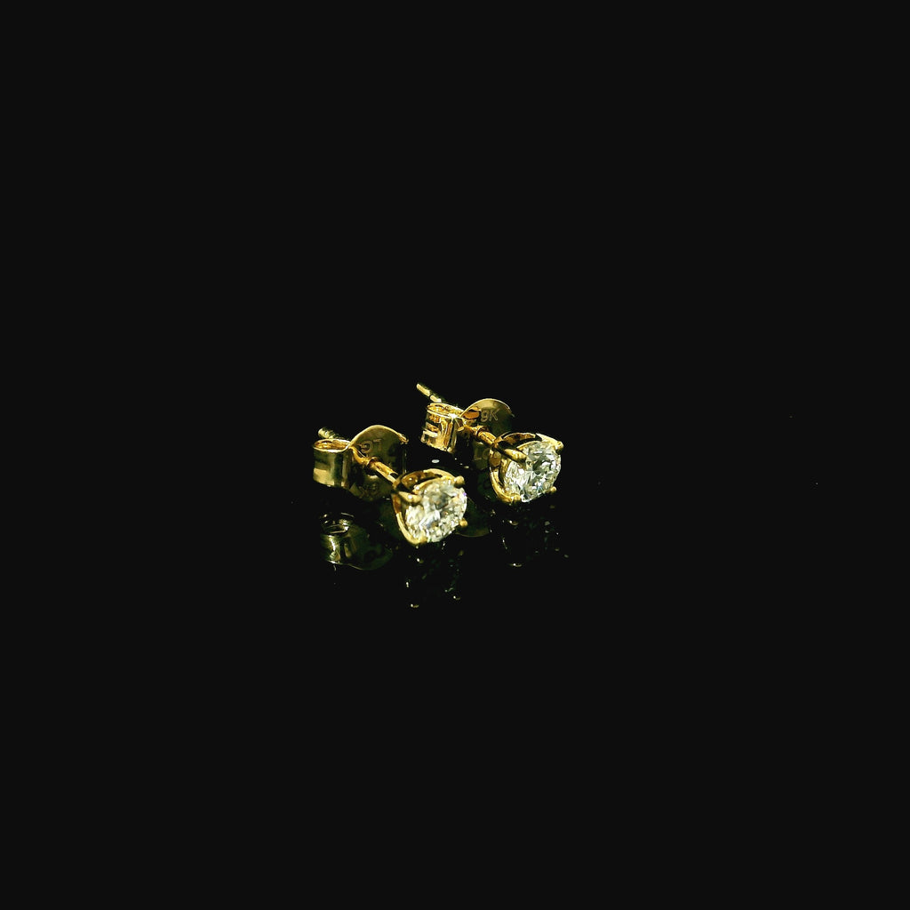 gold stud earrings with diamonds. lab grown diamond earring studs. stud diamonds. studs for women