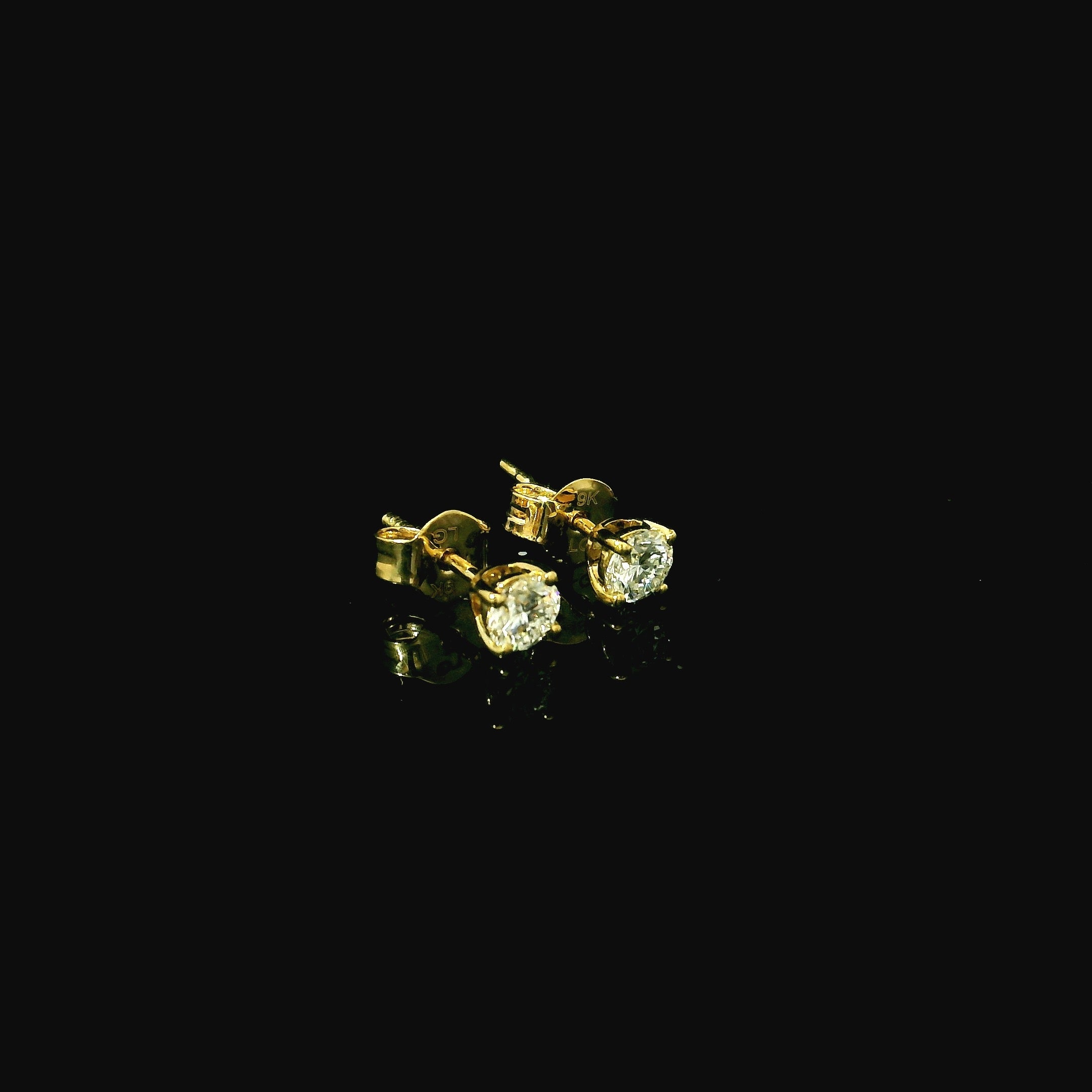 gold stud earrings with diamonds. lab grown diamond earring studs. stud diamonds. studs for women