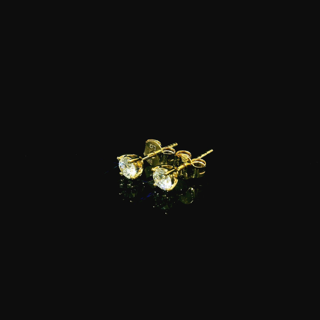 gold earring studs with lab grown diamonds. diamond studs for women. wedding jewellery