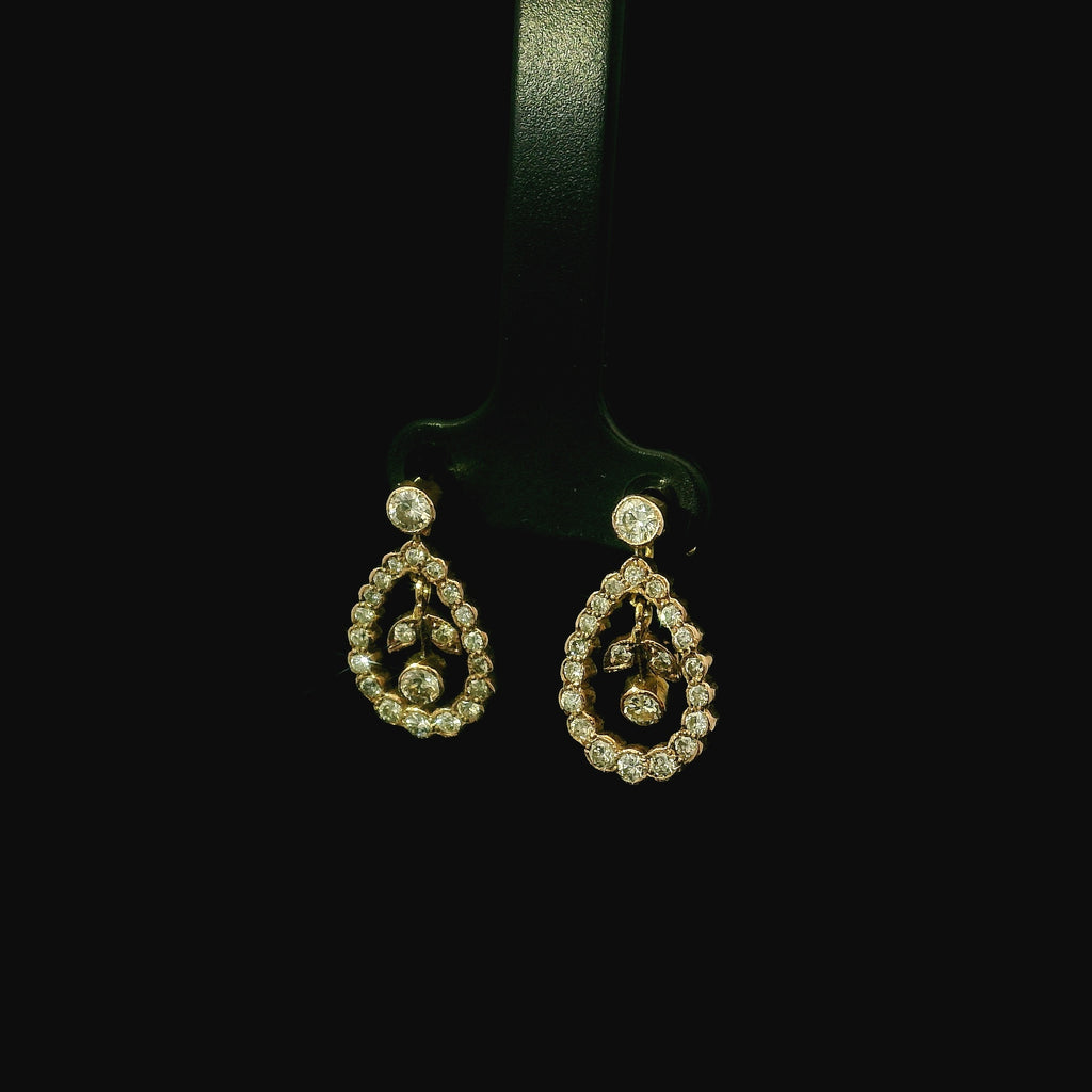 dangle pendant earrings for women with diamonds.