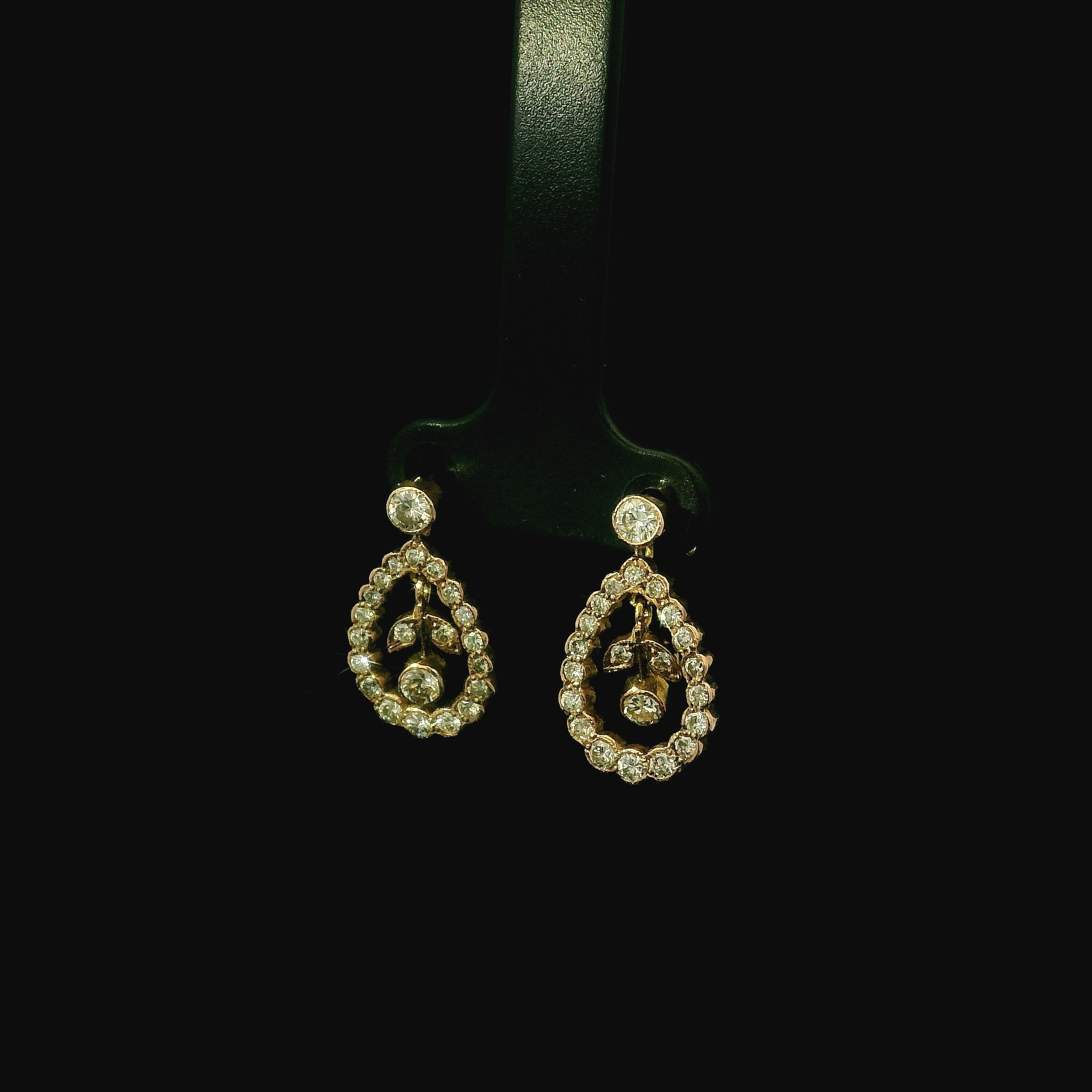 dangle pendant earrings for women with diamonds.