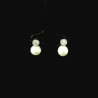 round brilliant cut diamond earings. diamond and pearl jewellery. pearl earrings. west malling jewellery