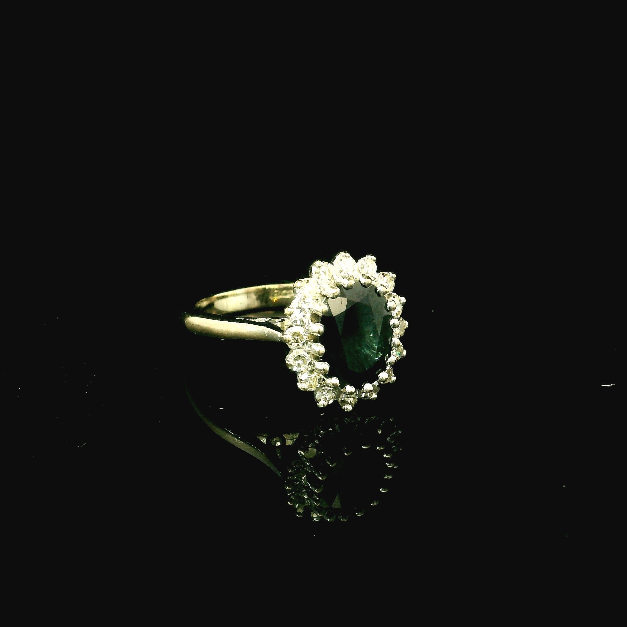 dark emerald green sapphire. dark green sapphire. green gemstone. green gemstome ring. emerald ring. white gold ring