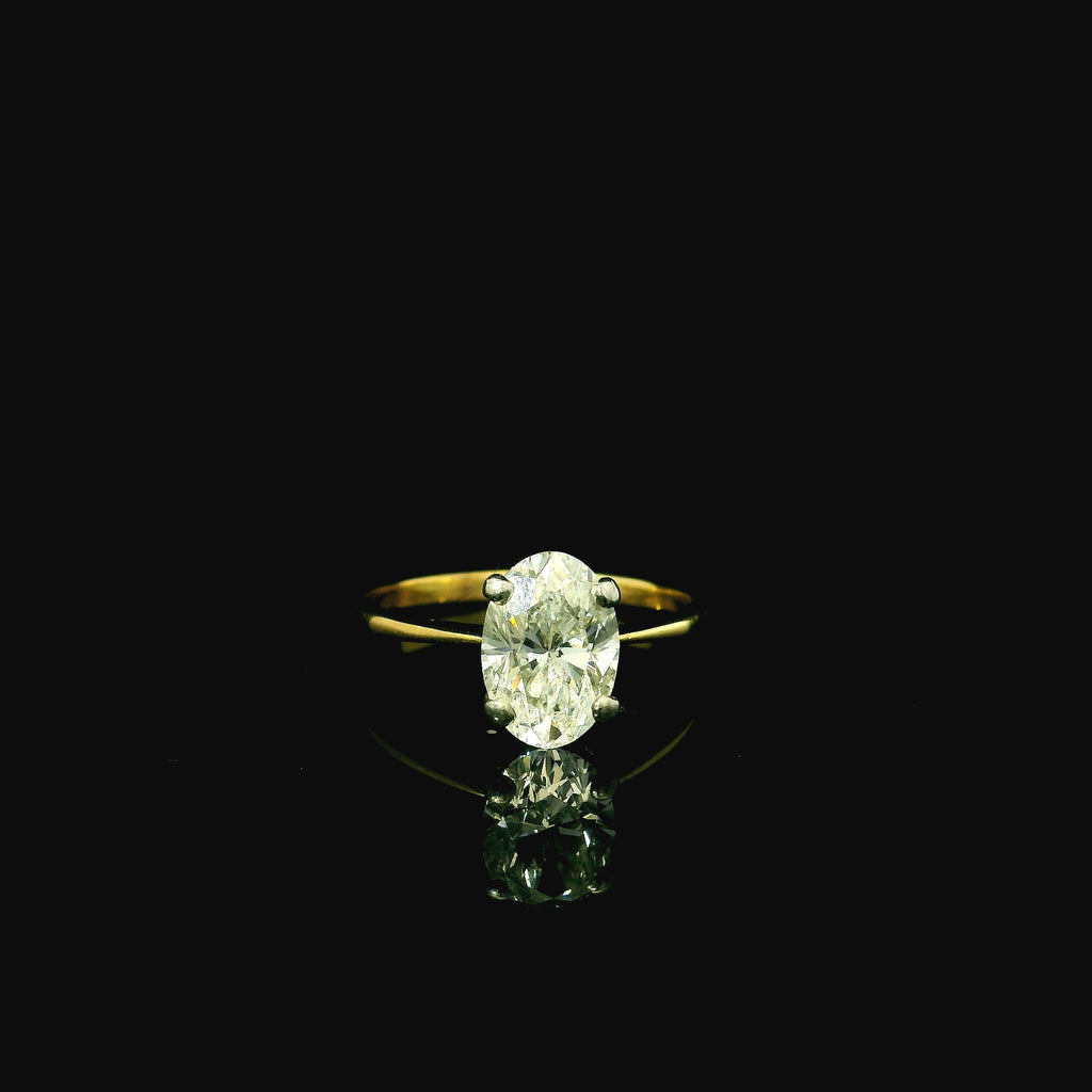 18ct yellow gold diamond ring. luxury engagement ring for women. oval cut diamond