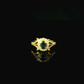 gold ring with oval sapphire stone and diamond cluster - vintage inspired
