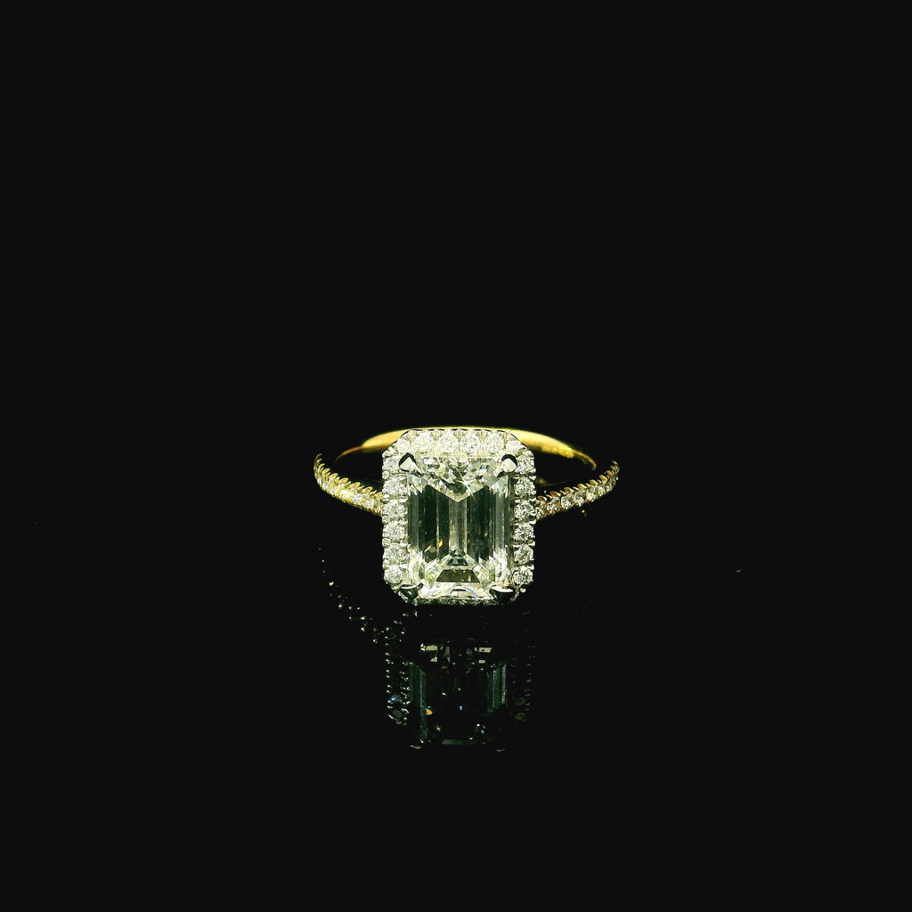 lab grown diamond ring. diamond ring with diamonds along band. gold ring with diamonds. gold ring with diamonds on shoulders