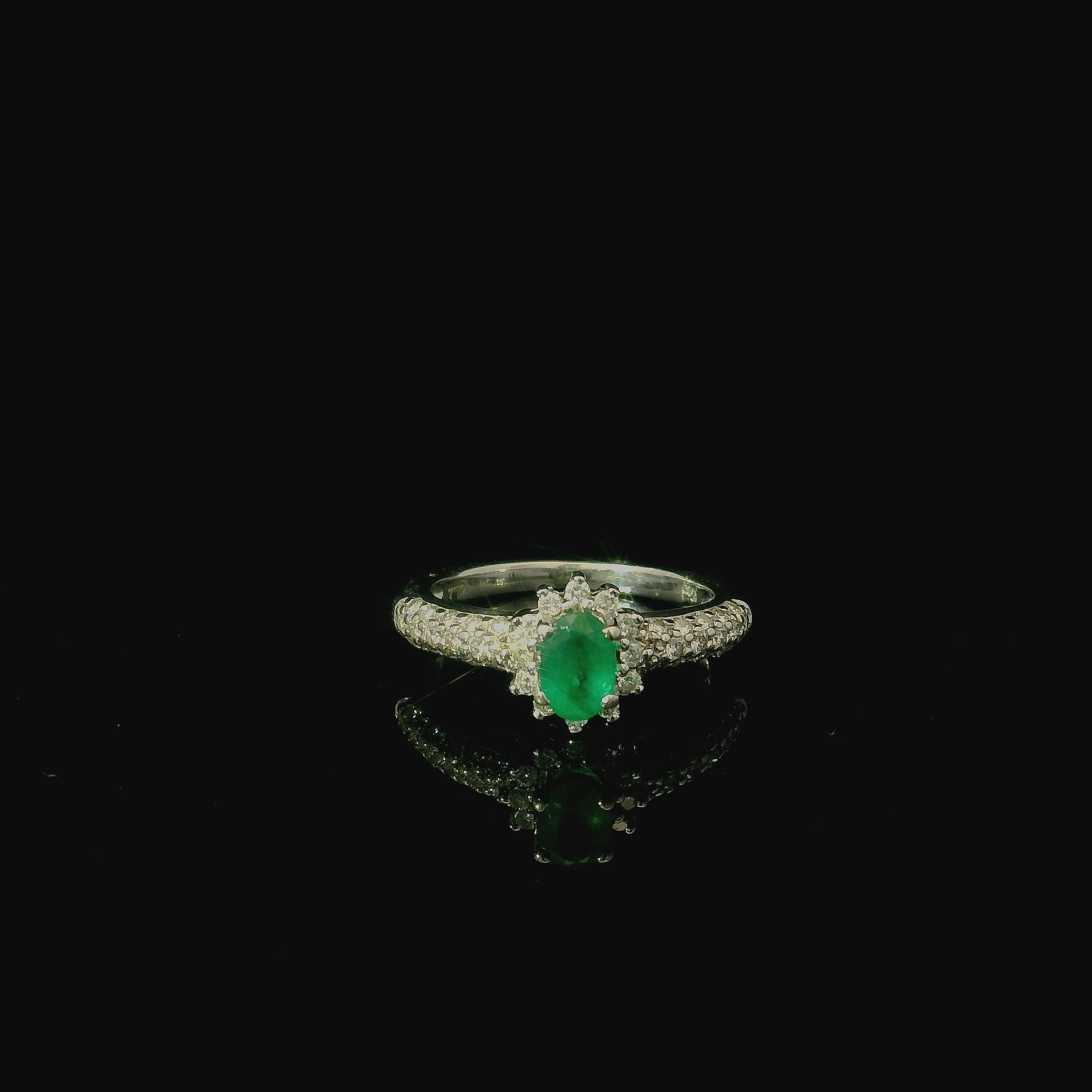 vintage jewellery shops in kent. independent shops. cute independent high street shops. oval cut emerald and diamond white gold ring for women.