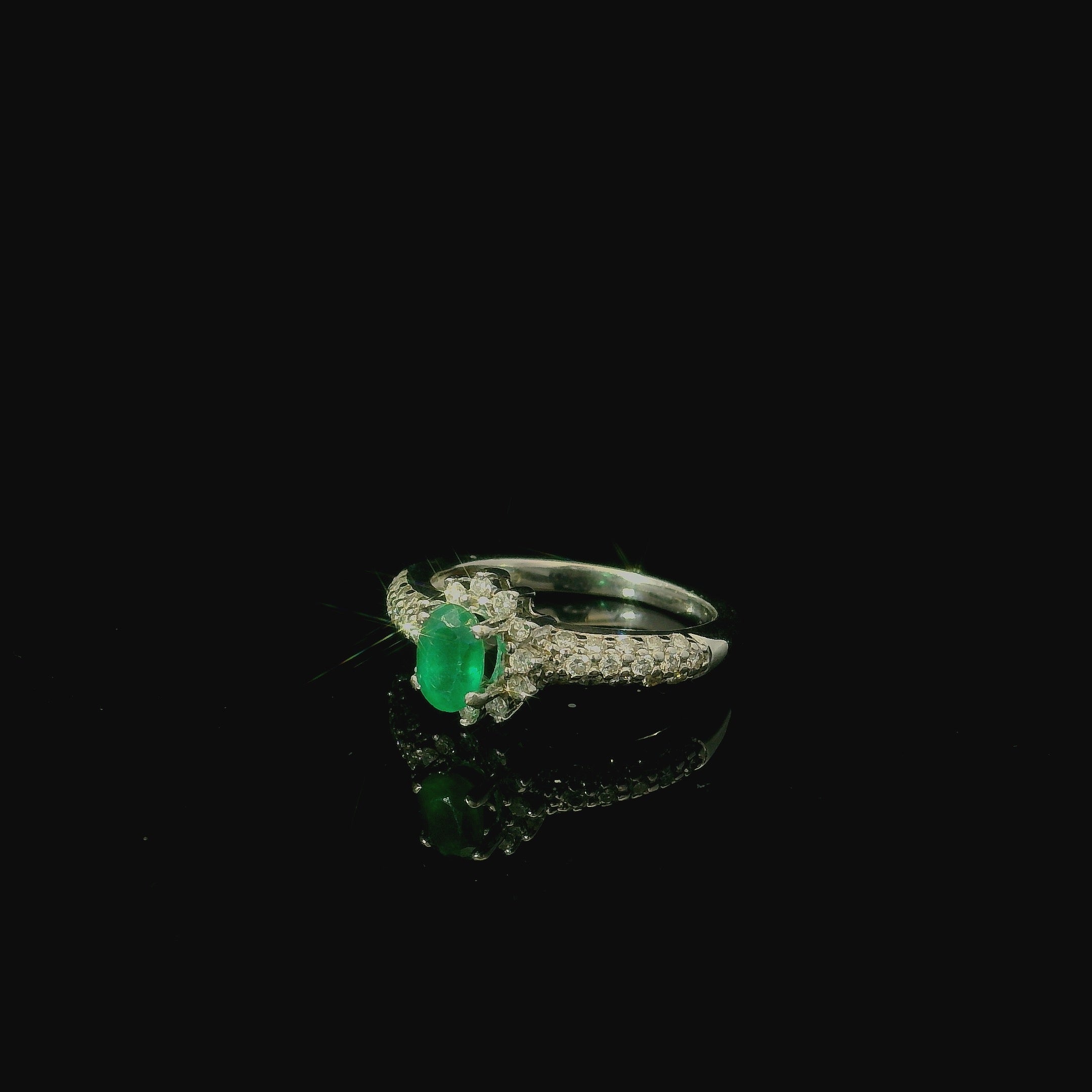 white gold emerald ring for women. authentic jewellery gift for women in kent. diamond ring. gifts for women