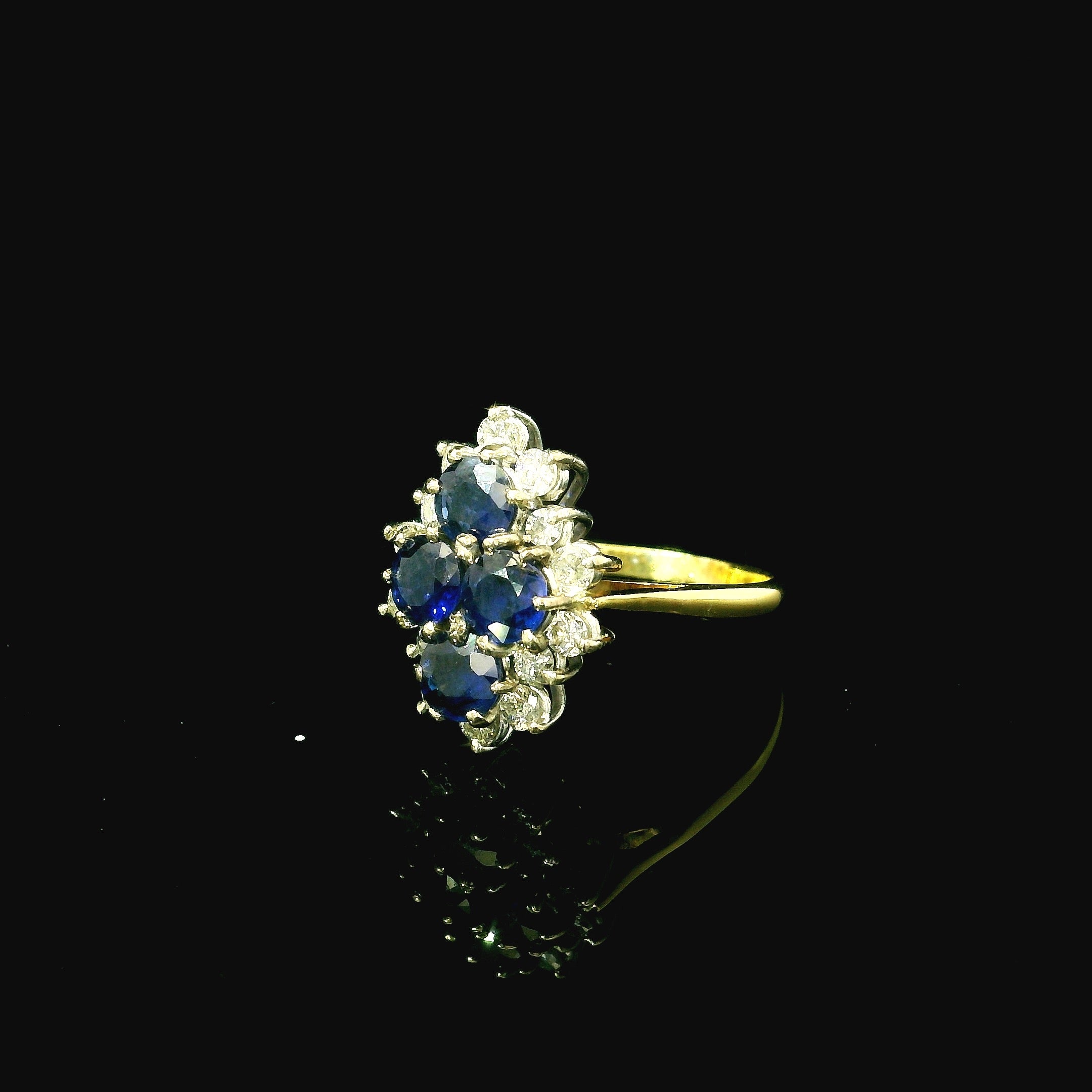 Marquise shaped cluster ring. sapphire gemstone ring