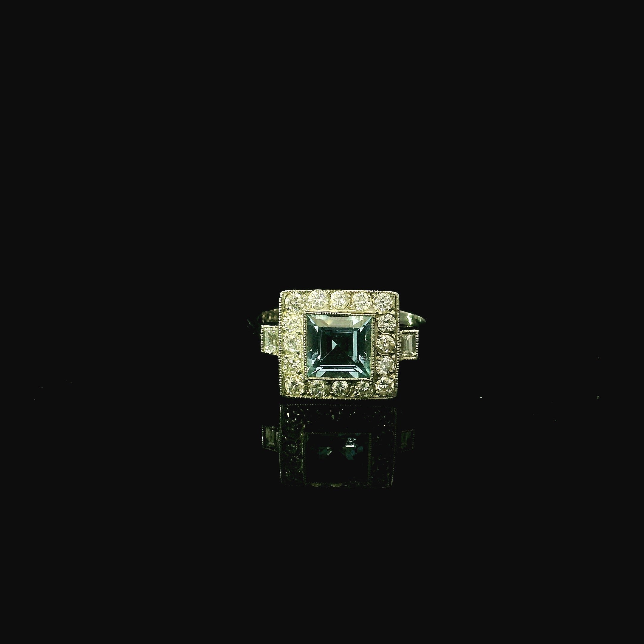 square aquamarine ring with cluster round diamonds - bold platinum ring