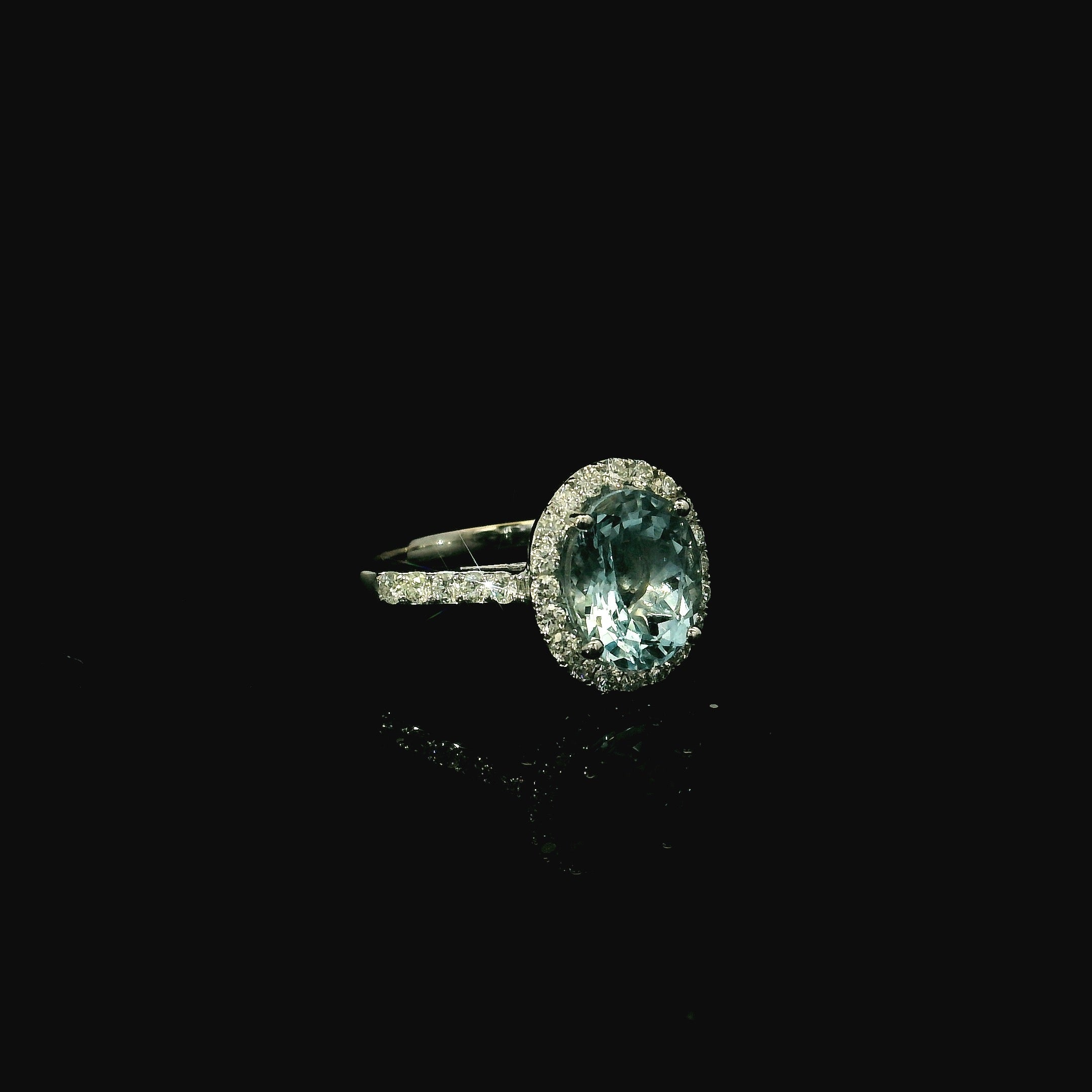 oval cut aquamarine and diamond cluster ring - stunning engagement ring available in kent