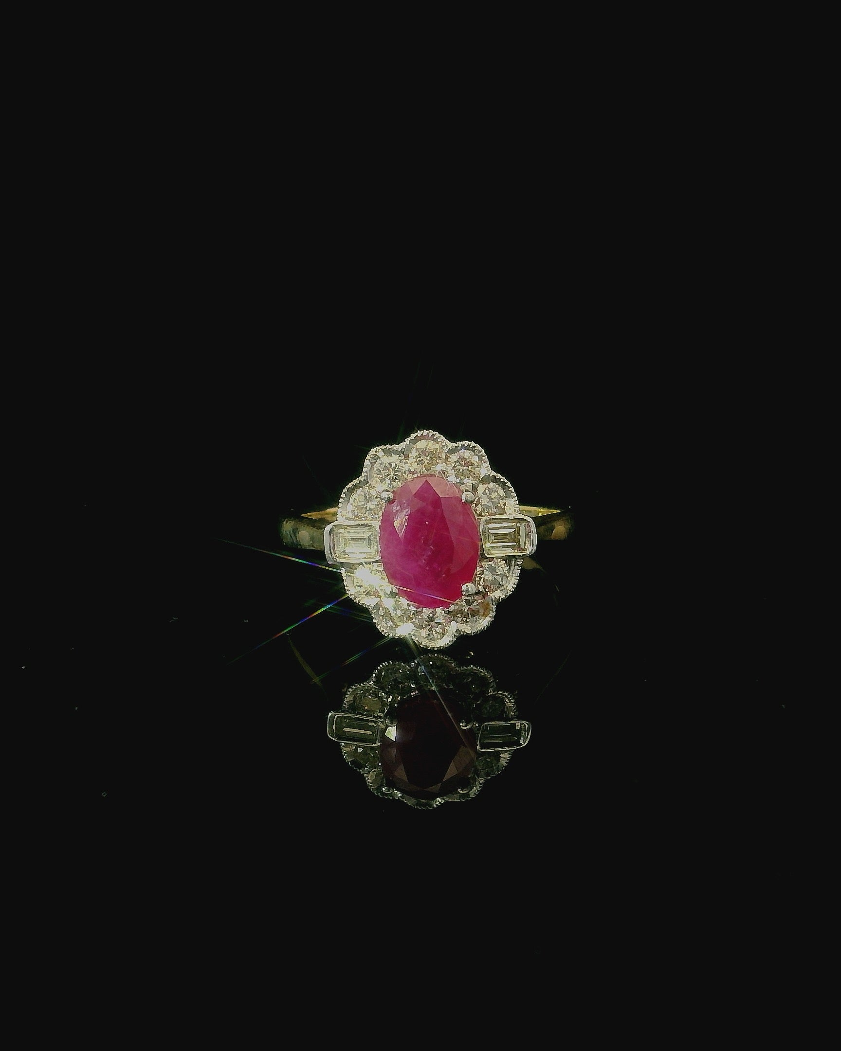 yellow gold ring. daisy floral flower shaped diamond ring. oval cut ruby ring. 