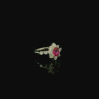 modern elegant ruby ring. contemporary jewellery for women. floral inspired diamond rings.
