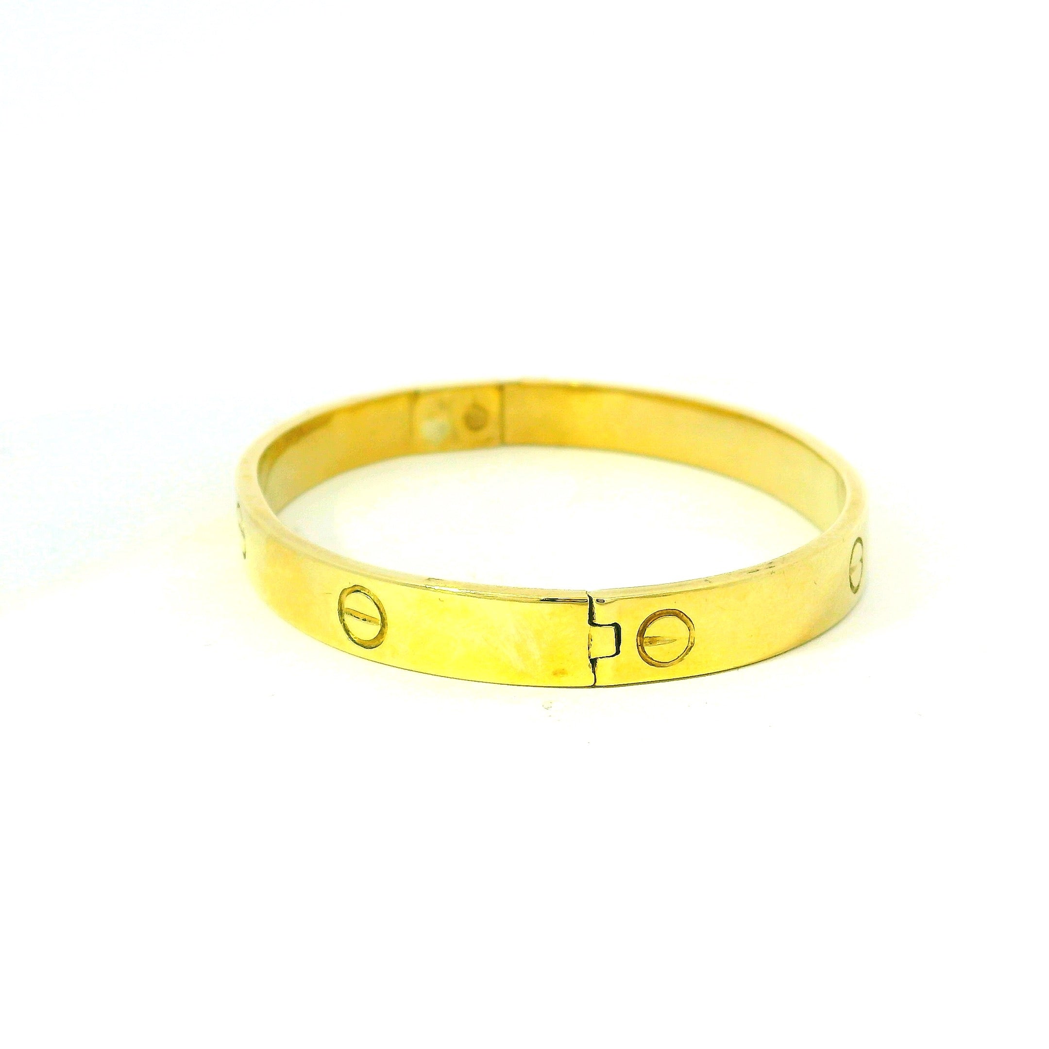 luxury minimalist gold bangle for women. traditional sleek bangle for women. gold bangle for women.
