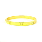 yellow gold bangle for women. screw design bangle. west malling bangles