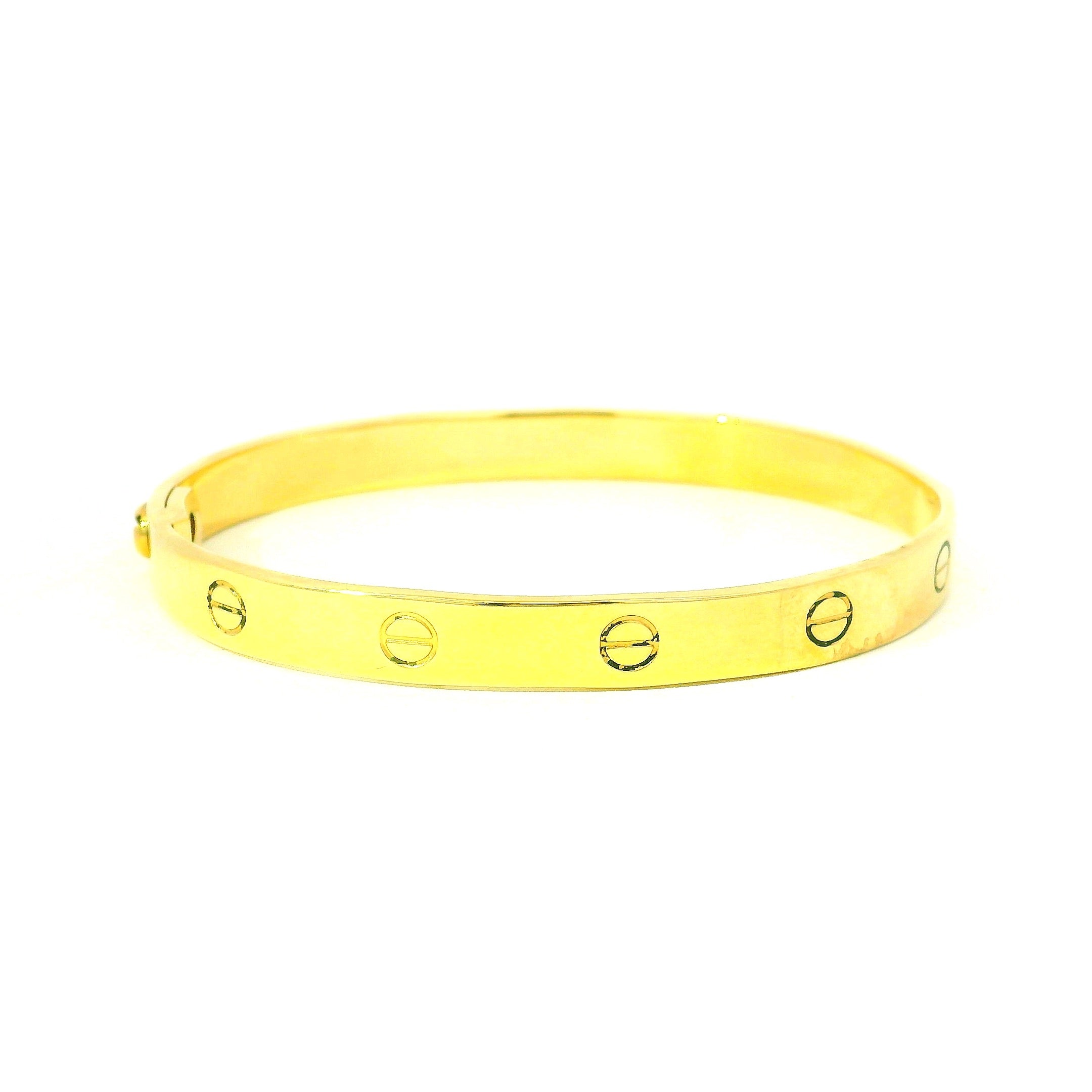 yellow gold bangle for women. west malling jewellery