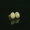 oval cut opal stones. opal jewellery. vintage inspired jewellery. diamond. stud earrings. 