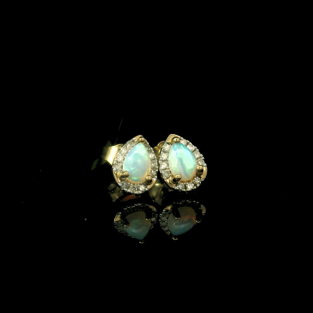 opal jewellery in kent. opal stud earrings. diamond stud earrings. opal and diamond earrings. 