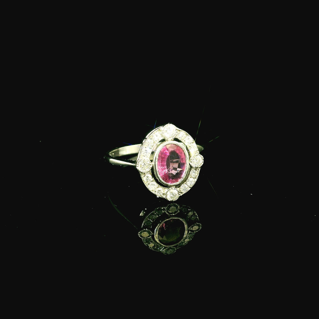 oval cut sapphire gem stone ring. white gold ring with pink gem stone. pink gem gold ring