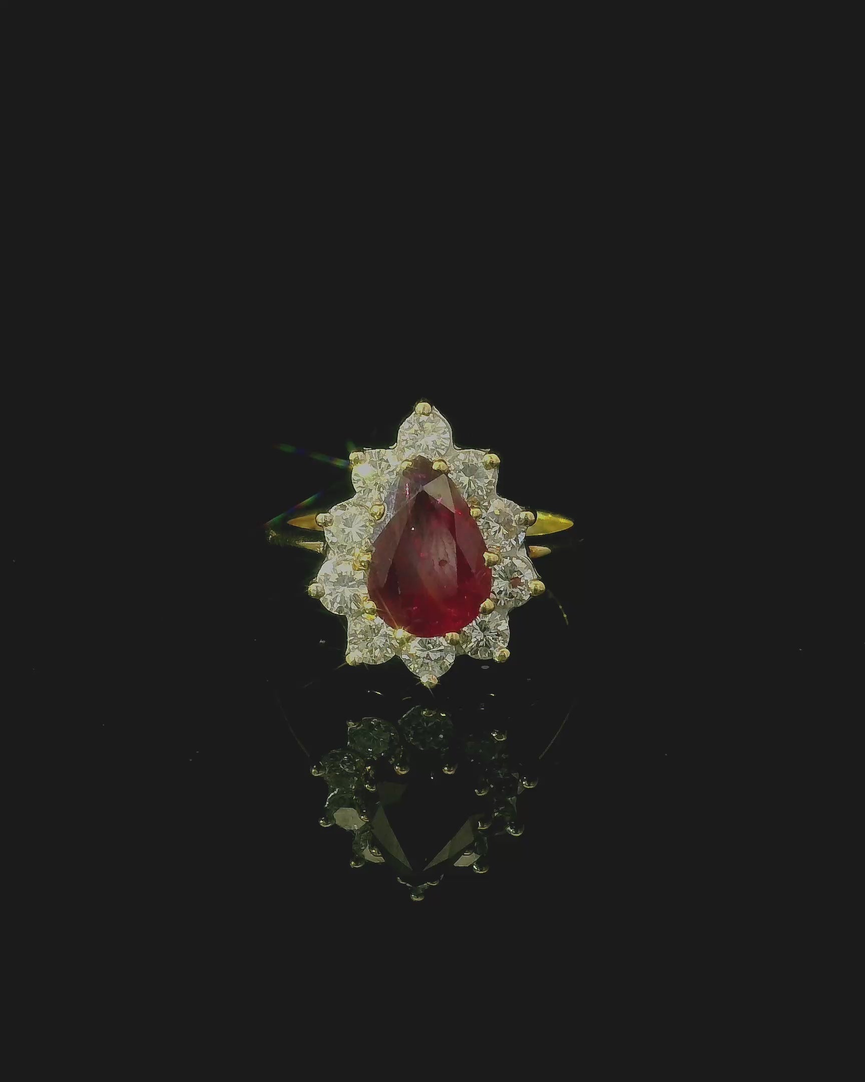 vibrant red ruby and gold ring with diamonds. engagement ring for women. second hand luxury rings 
