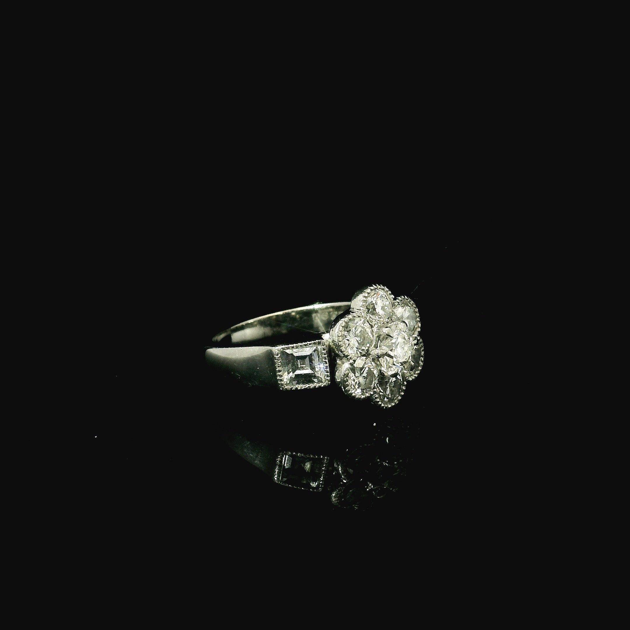 daisy shaped ring with diamonds. platinum rings for women. daisy flower shaped rings. daisy jewellery. flower inspired jewellery