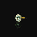 white and yellow gold aquamarine ring with diamonds for her
