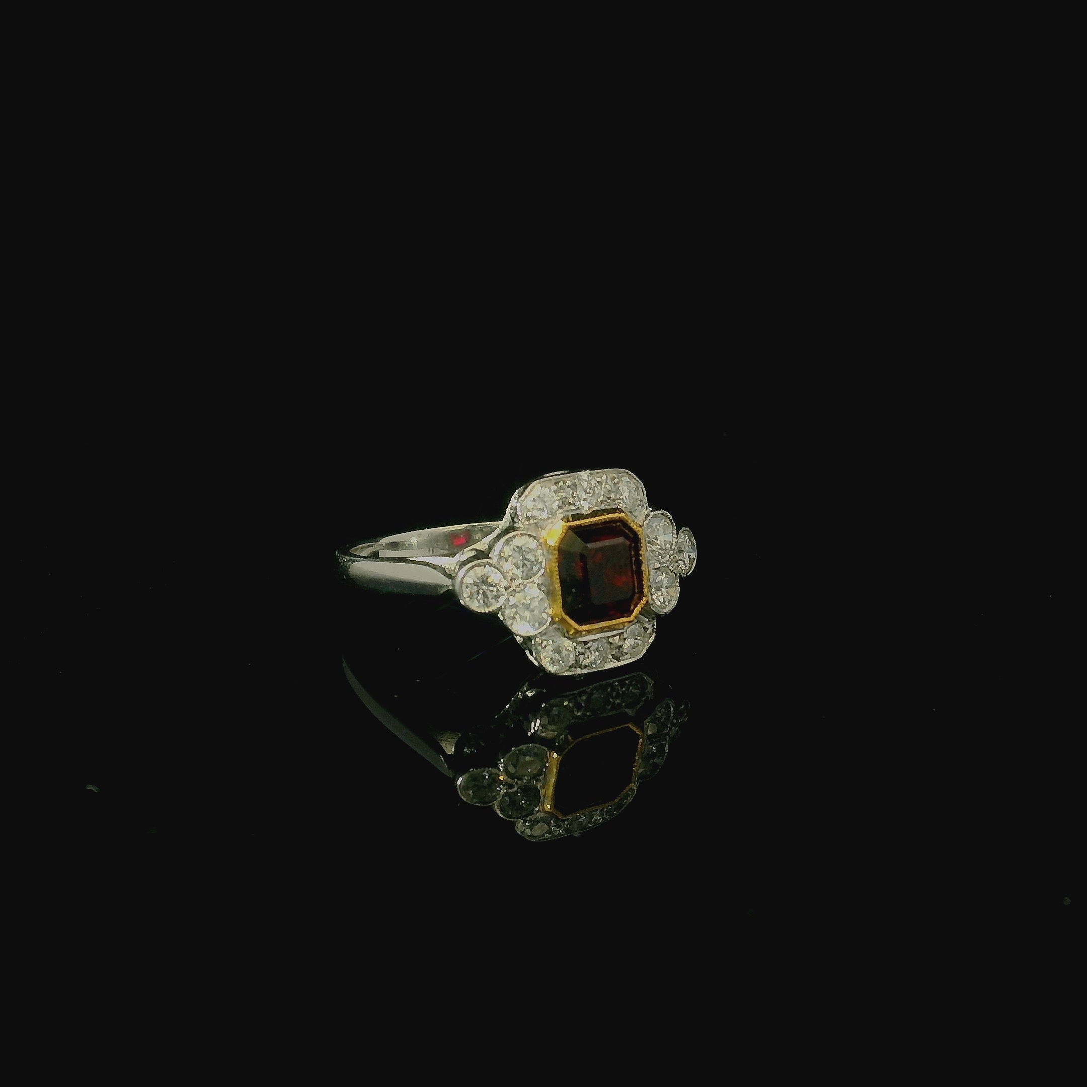 bold statement ring for women. luxury art deco 1920s authentic vintage antique jewellery. ruby gemstone. yellow gold.