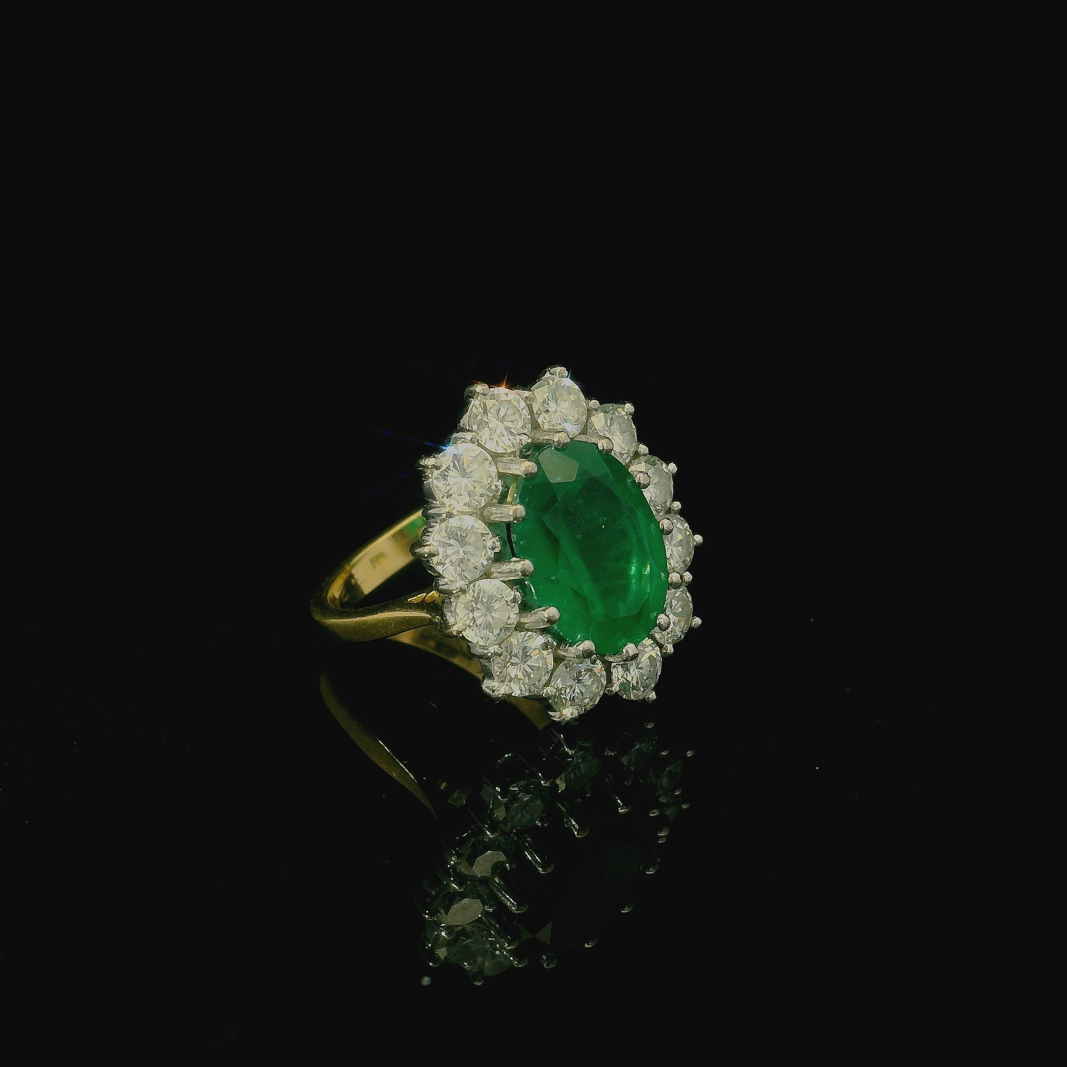 18ct White Gold and Yellow Gold Oval Cut Zambian Emerald Ring - Andrew Smith Jewellers