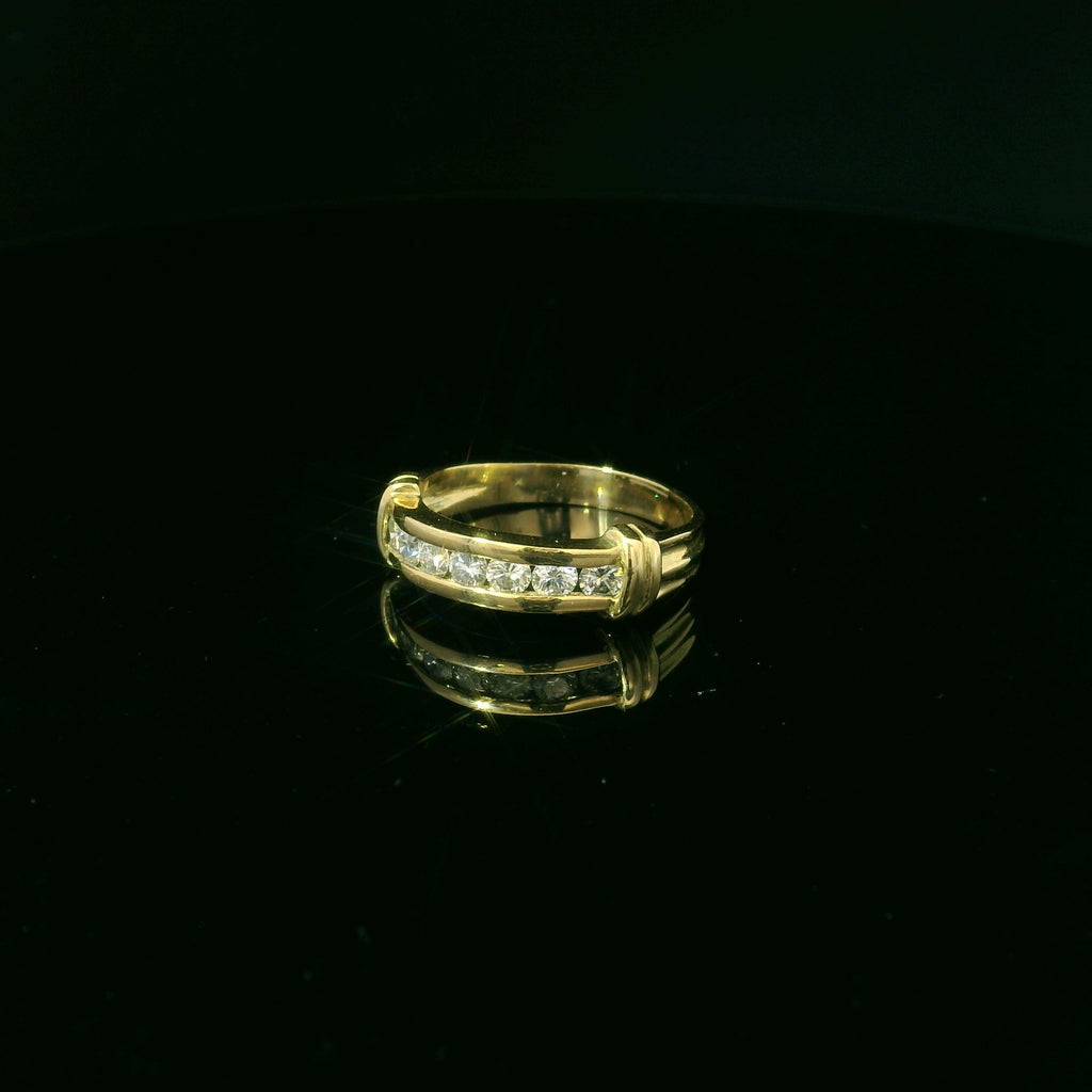 Gold ring with embedded diamonds west malling jewellers. 