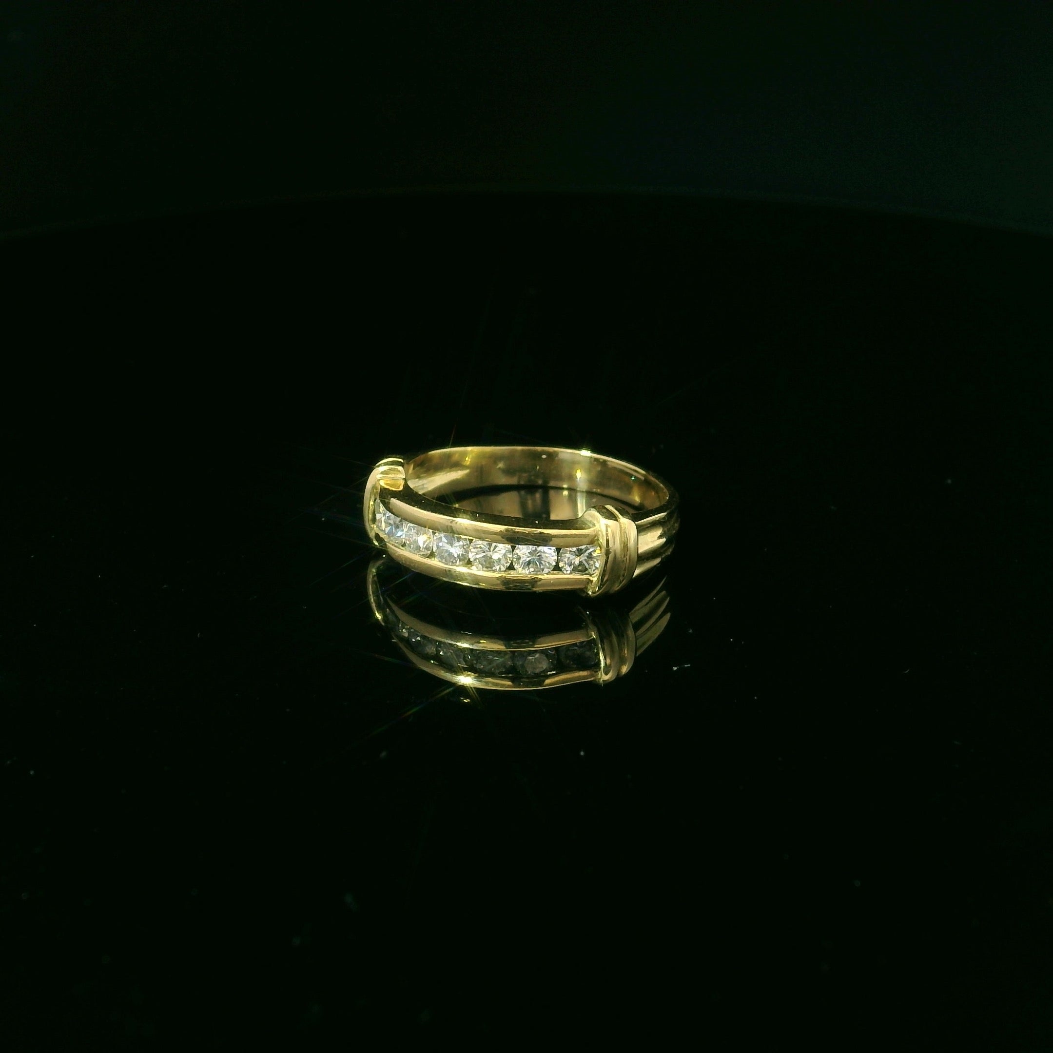 Gold ring with embedded diamonds west malling jewellers. 