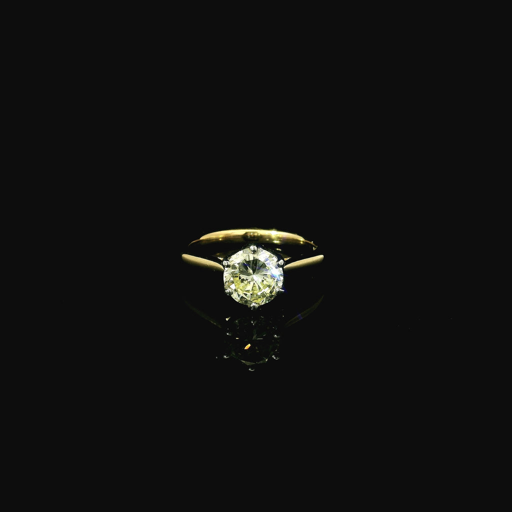 yellow gold with platinum ring. diamond ring. certificated round brilliant cut diamond. solitaire diamond