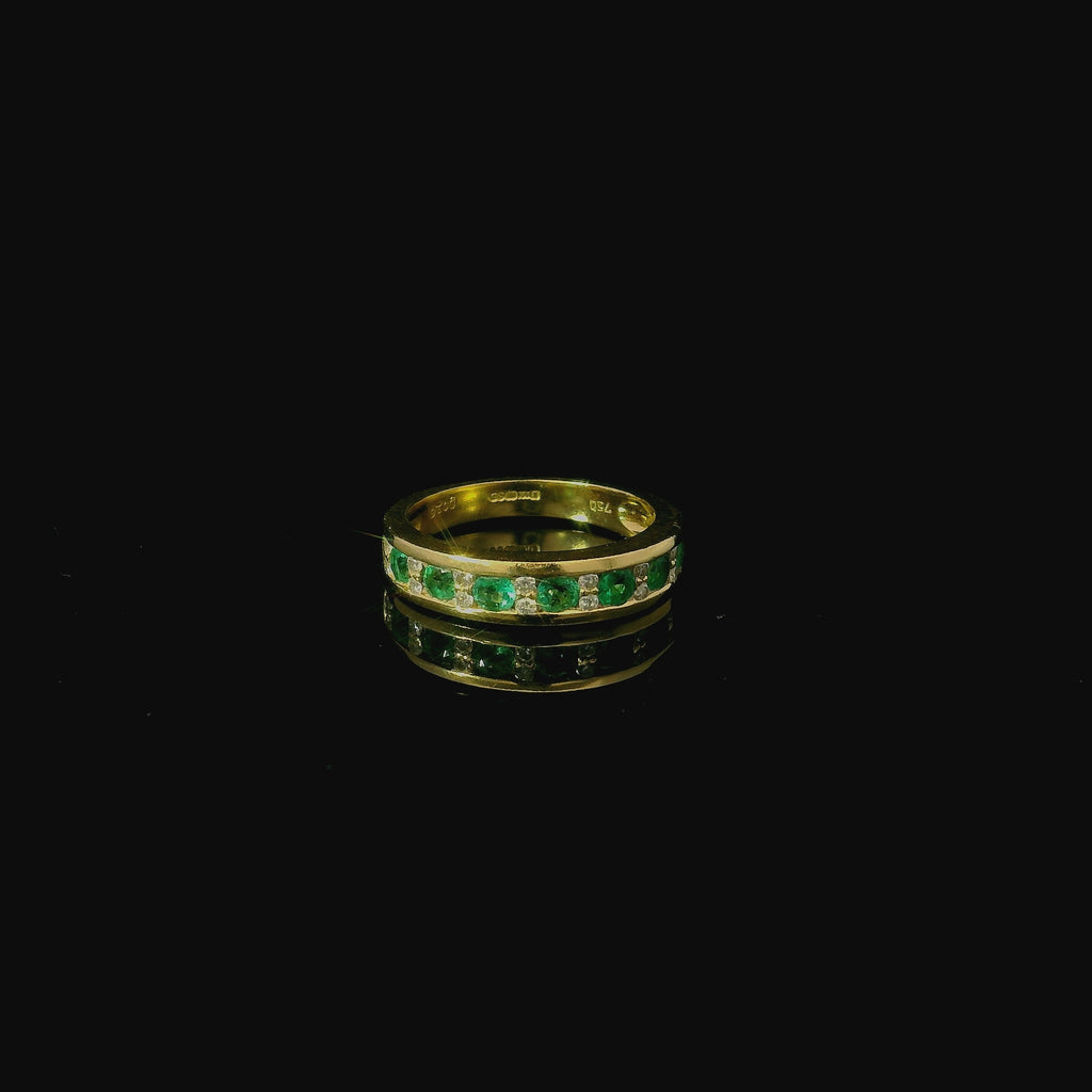 yellow gold channel set emerald and diamond halt eternity ring. vintage and antique jewellery for sale near me. 