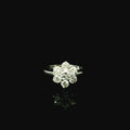white gold daisy inspired ring for women with diamonds.
