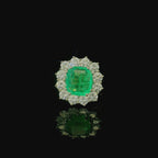 cushion cut solitaire emerald ring. gold ring for women. diamond cluster ring. west malling. jewellers in kent
