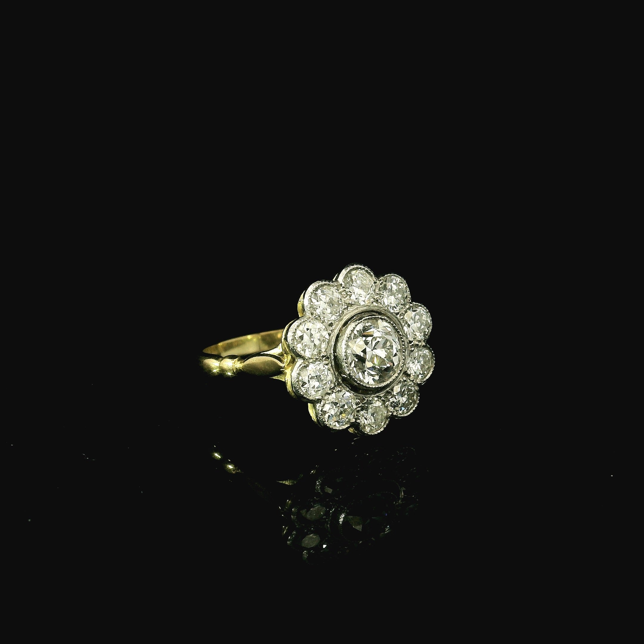 flower shaped ring with diamonds. yellow gold ring for women. diamond ring for women. floral ring