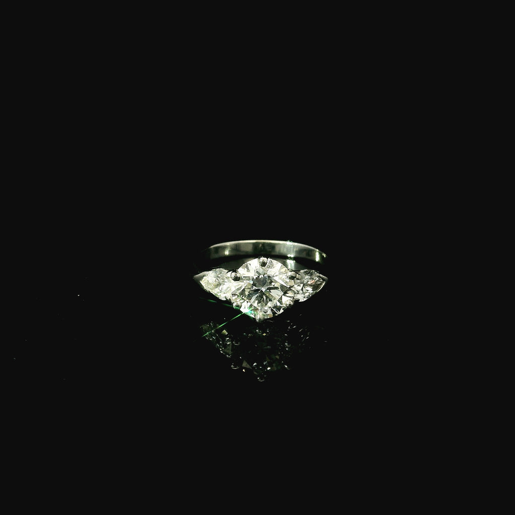 platinum ring. solitaire round brilliant cut diamond. pear cut diamond ring. luxury jewellery for women. luxury jewellery west malling