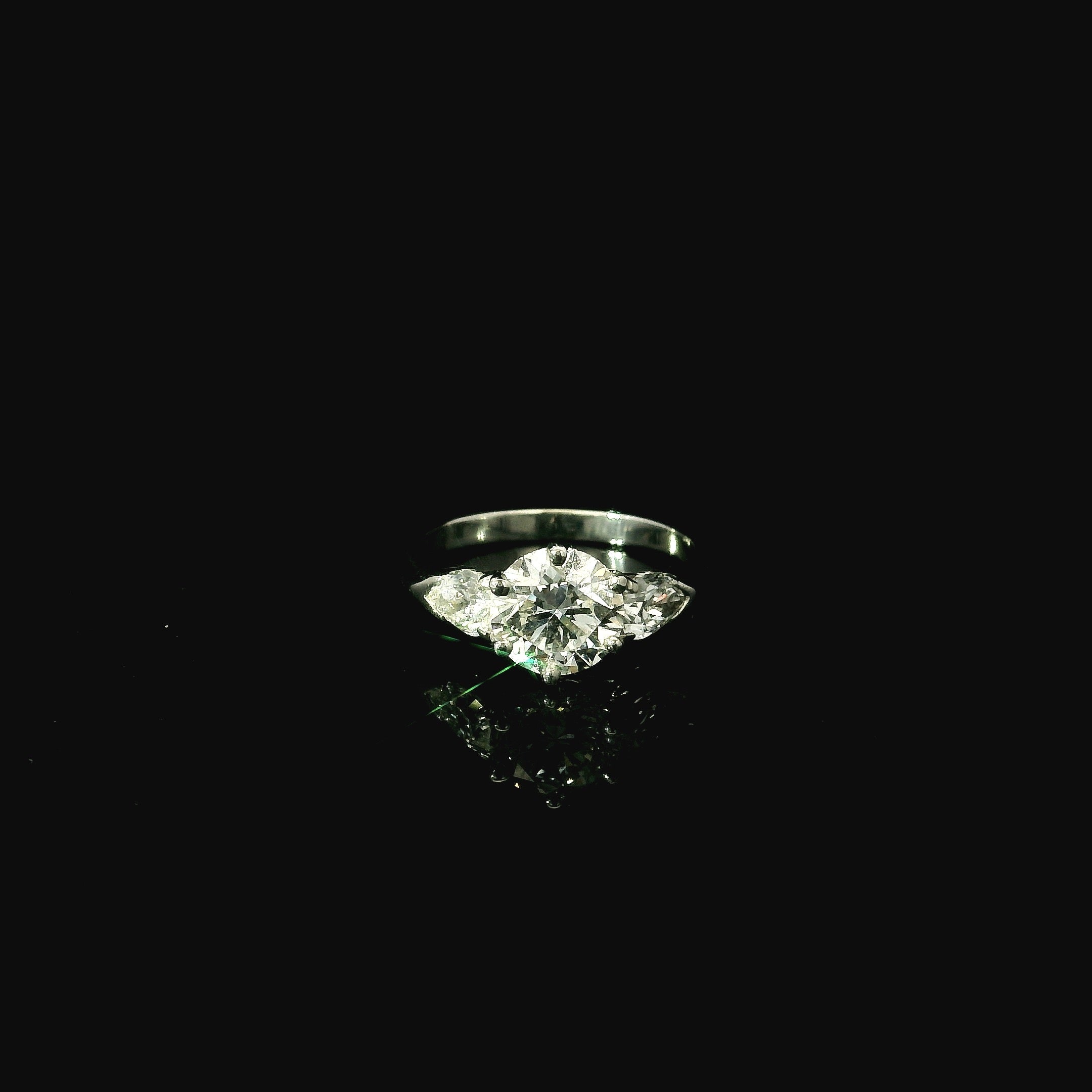 platinum ring. solitaire round brilliant cut diamond. pear cut diamond ring. luxury jewellery for women. luxury jewellery west malling