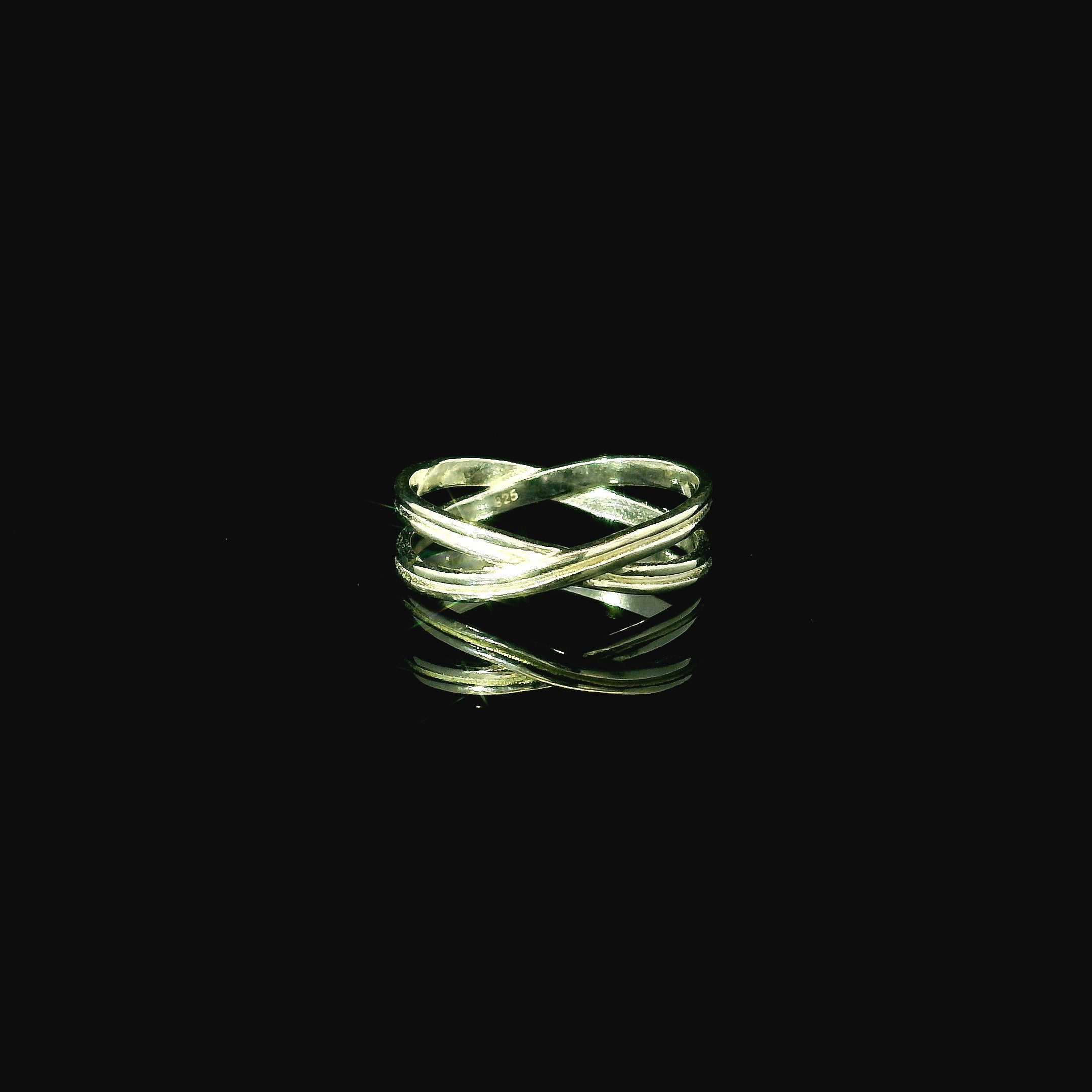 silver ring for women with crossed over bands. available in west malling
