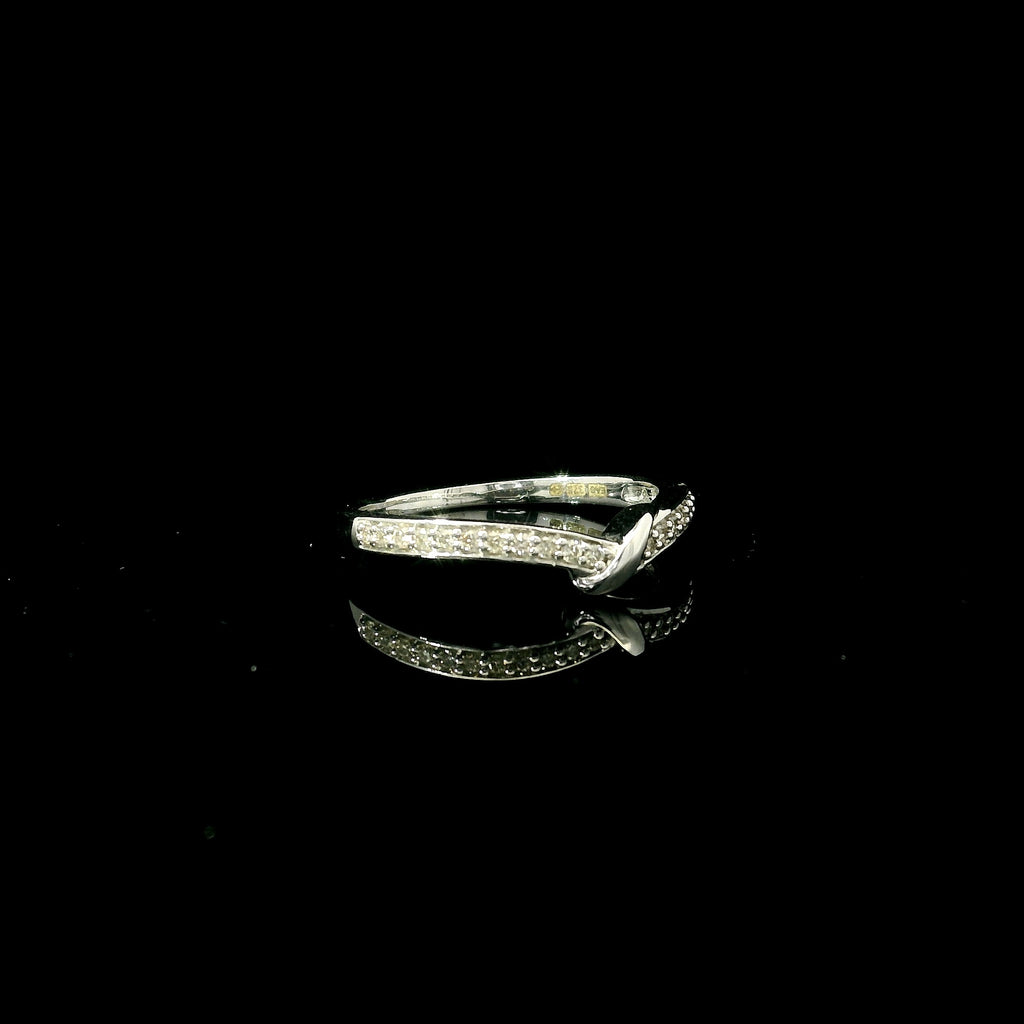 shaped ring. twist shaped ring for women. white gold twist shape jewellery