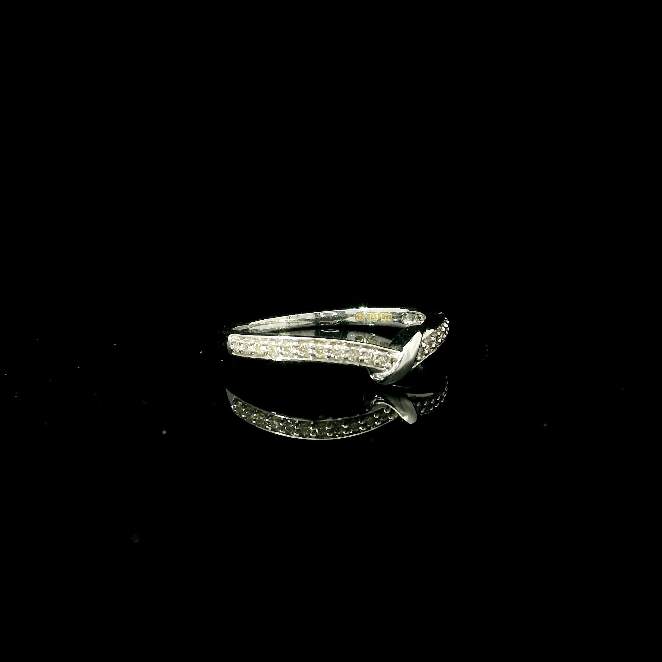 shaped ring. twist shaped ring for women. white gold twist shape jewellery