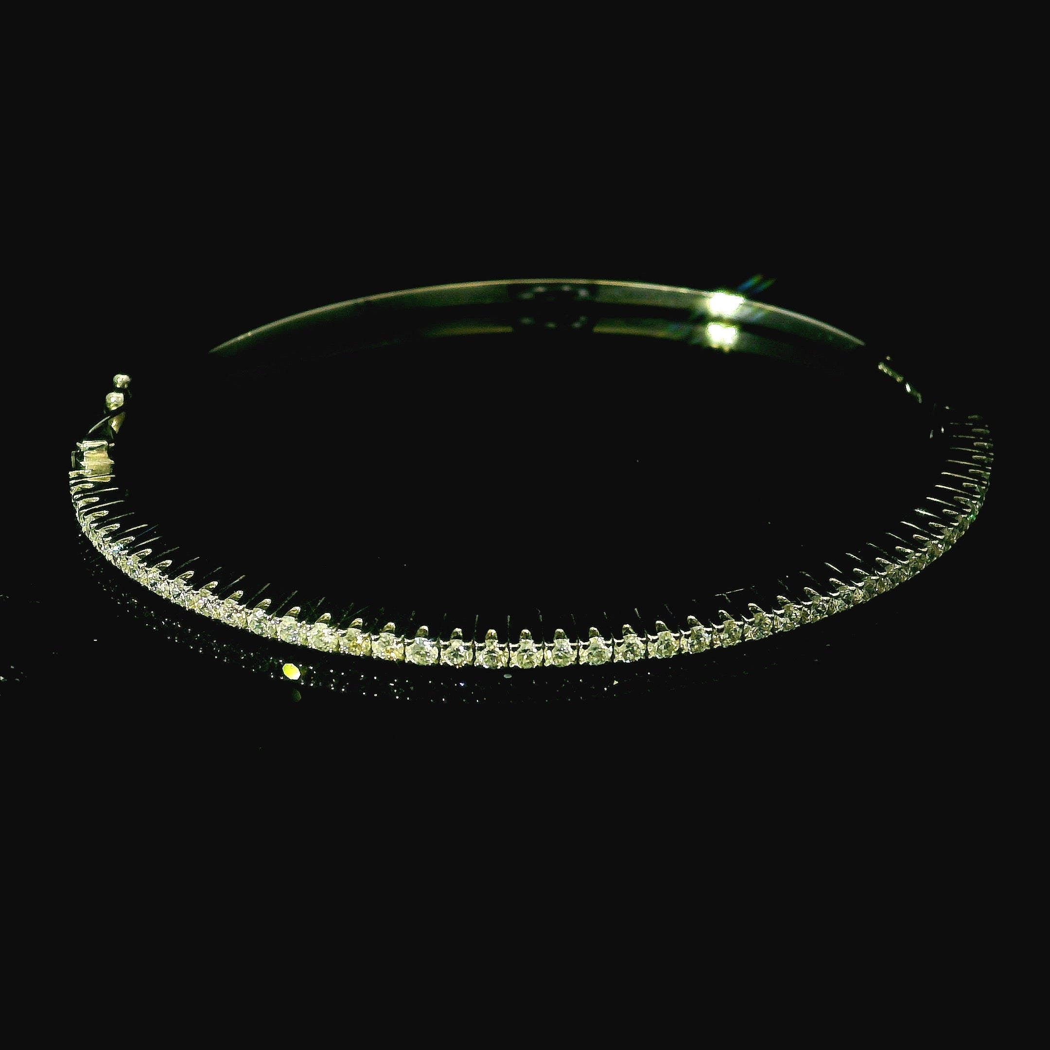 gold bangle with diamonds. diamond bangle. diamond jewellery.