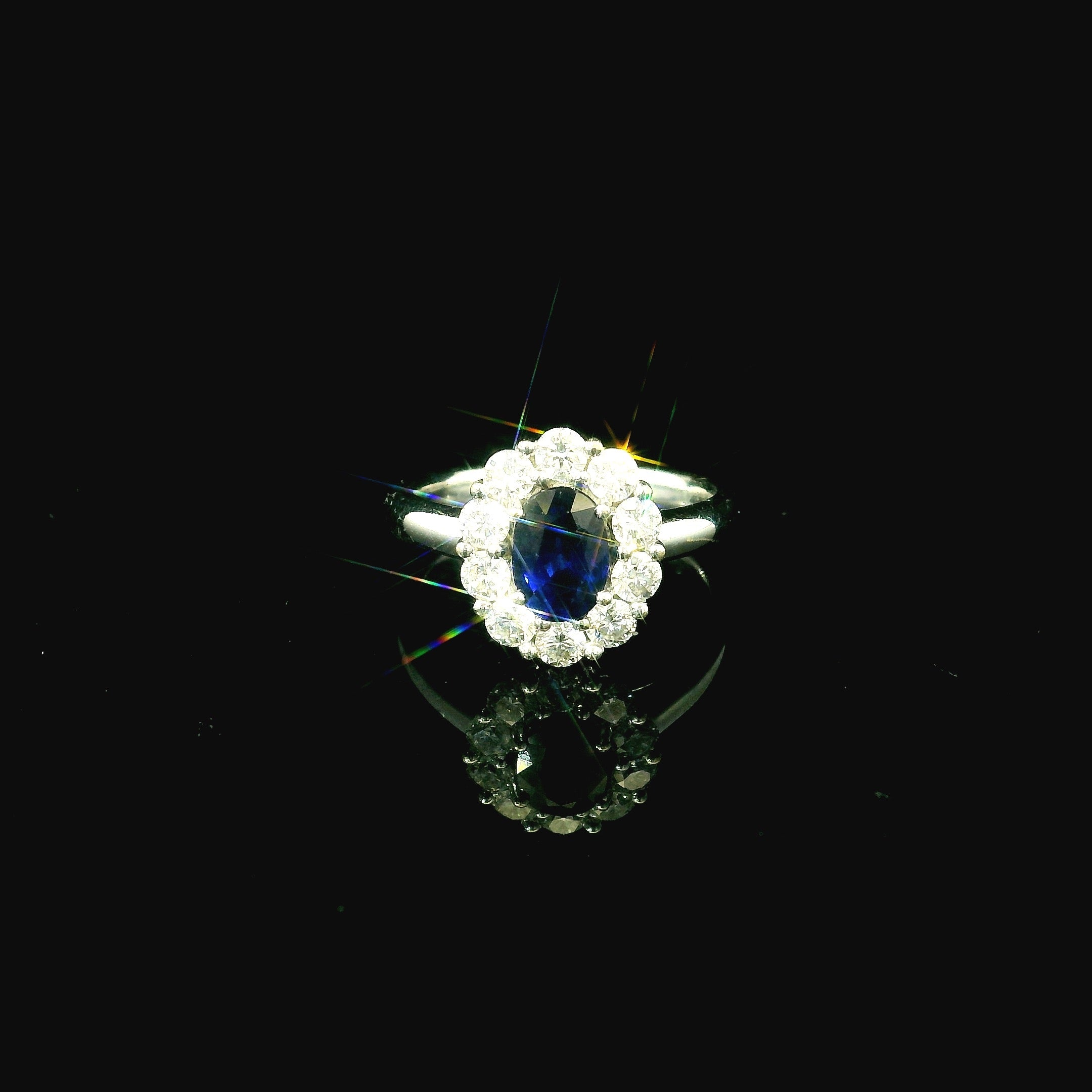 sapphire white gold ring. sapphire oval cut ring. oval cut sapphire ring