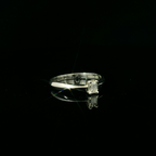white gold simple ring. emerald cut diamond